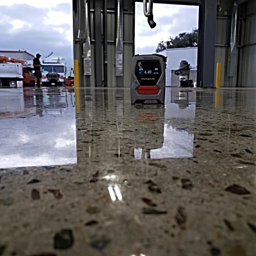 Industrial concrete floor by Fēnix Finish: vehicle bay